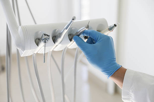 Professional Tooth Extraction technician working in Cottonwood Shores, TX